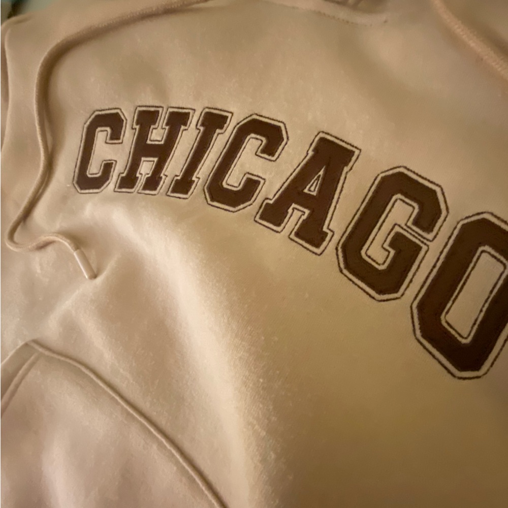 A new light brown, with a smooth cotton texture on the inside